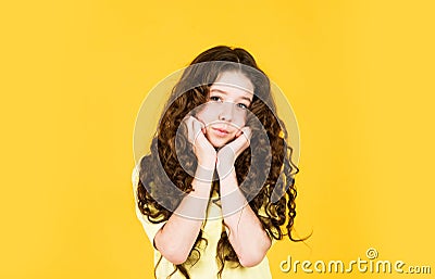 Beautiful little model. Healthy curls. Long hair. Easy hairdo. Beauty supplies. Perfectly untangle curly hair. Pretty Stock Photo