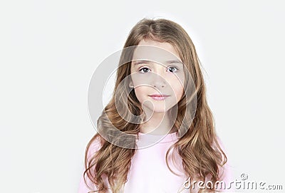 Beautiful long hair smiling face caucasian child girl teen age closeup portrait Stock Photo