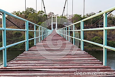 Beautiful of the longest suspension bridge in North eastern Region at Tana Rapids National Park,Ubonratchatani, Thailand Stock Photo