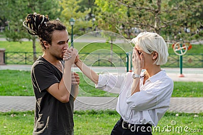 Beautiful loving couple is spending time together in the park Stock Photo