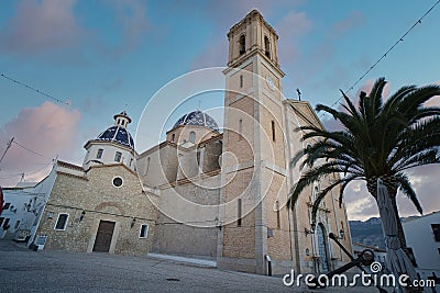 Beautiful low angle shot of a church with a tree. Beautiful architecture in Altea Spain Stock Photo