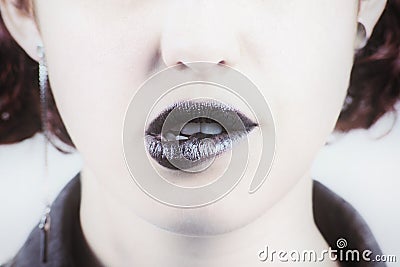 Beautiful make up of glamour black gloss lips Stock Photo