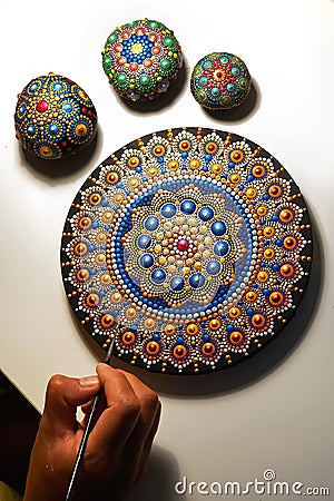 Beautiful mandala painted with a brush Stock Photo