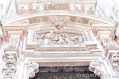 Beautiful Marble Facades of Duomo di Milano with Religious Statues Editorial Stock Photo
