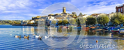 Beautiful Marta village,view with Bolsena lake,boats and old cathedral,Lazio,Italy. Stock Photo