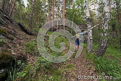 beautiful mature women travels through the mountains Stock Photo