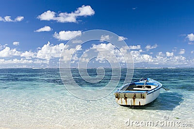 Beautiful Mauritius view with blue ocean and boat Stock Photo