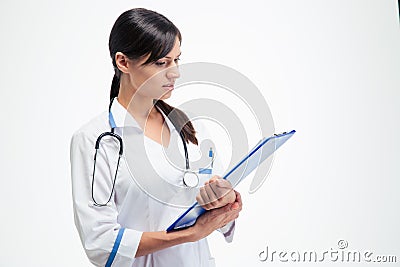 Beautiful medical doctor reading notes on clipboard Stock Photo