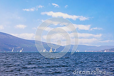 Beautiful Mediterranean landscape. Sailboats on water of Kotor Bay. Montenegro Stock Photo