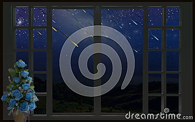 Beautiful meteor showers over the valley in window view Stock Photo
