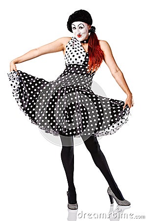 Beautiful mime in spotty dress posing Stock Photo