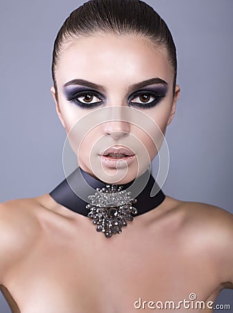 Beautiful model with smokey eyes make up Stock Photo