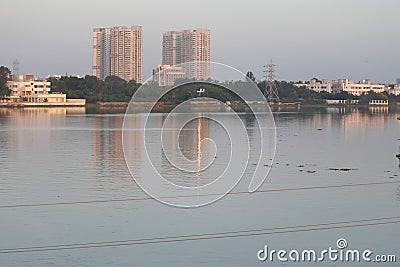 Beautiful modern high rise buildings across the lake are built in Chennai city of India Editorial Stock Photo