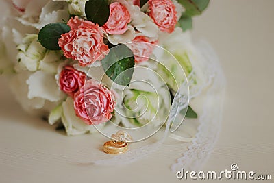 Beautiful modern wedding bouquet on a white table. Wedding attributes. No people Stock Photo