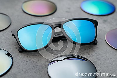 Beautiful mogern glasses with colored lens in optical shop Stock Photo