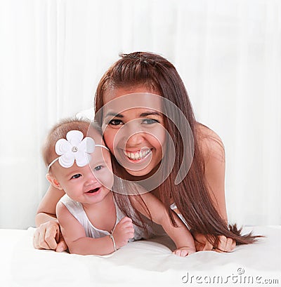 Beautiful mom and cute baby smile Stock Photo