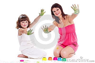 beautiful mommy and her kid paintig a picture for kindergardern. hobby, education, development , child developing Stock Photo