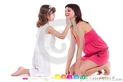 beautiful mommy and her kid paintig a picture for kindergardern. hobby, education, development , child developing Stock Photo