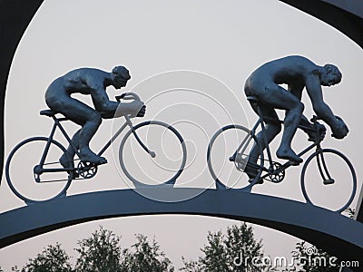 Beautiful monument dedicated to the tour of France near the tour Editorial Stock Photo