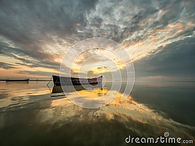 Beautiful morning landscape with boats on the lake at the sunrise Stock Photo