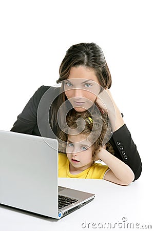 Beautiful mother and daughter laptop computer Stock Photo