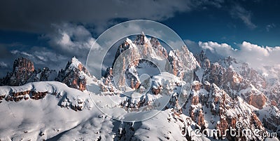 Beautiful mountain peaks in snow in winter at sunset Stock Photo