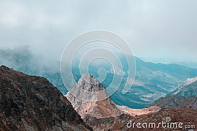 Beautiful mountain range covered with fog Stock Photo