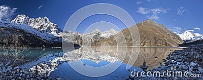 Beautiful mountain view with reflection in Gokyo Lake, Himalayas Stock Photo