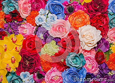 Beautiful multicolored artificial flowers background. Stock Photo