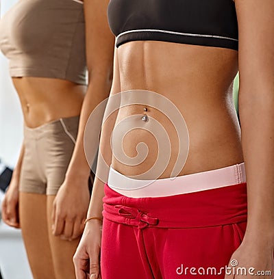 Beautiful muscular female abdomens Stock Photo