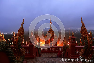Beautiful Naga statue and arched entrance In the morning Before sunrisenat Wat Doi Phra Chan Stock Photo
