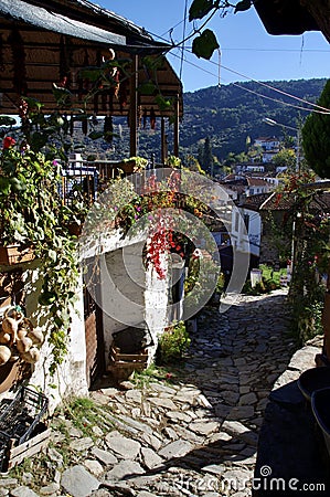 Beautiful, narrow streets and buildings in this typical Turkish Hill village. Editorial Stock Photo