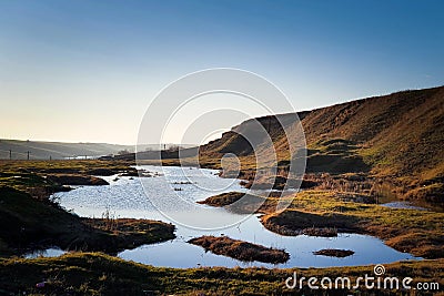 Beautiful natural lake on top of the hills Stock Photo