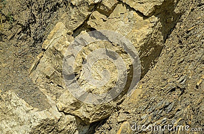 Beautiful natural texture of Caucasus mountains and rocks on the Black Sea coast in Olginka. Golden color. Stock Photo