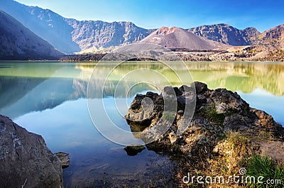 Beautiful nature background Segara Anak Lake in early morning. Mount Rinjani is an active volcano in Lombok, indonesia. Stock Photo
