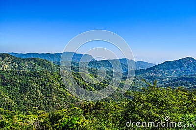 Beautiful nature view, Thai landscape of green mountain, Green mountain and blue sky in the afternoon at thailand Stock Photo