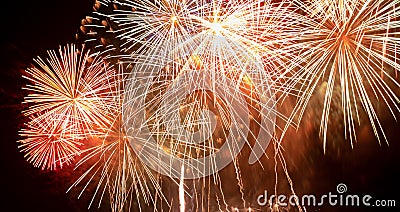 Brightly Colorful Fireworks Light Up the Sky. Beautiful New Year Fireworks. Dark Sky. Explosion. Abstract Colored Firework Stock Photo