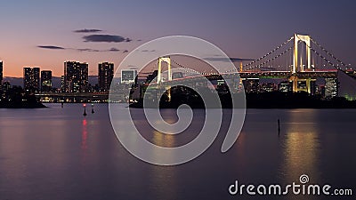 Beautiful night city scape of Tokyo bay with Tokyo rainbow bridg Stock Photo
