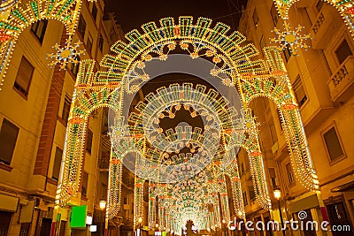 Beautiful night lights in Fallas fest of Valencia in calle Sueca Stock Photo