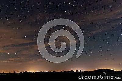 Beautiful night sky, with clouds and constellations Stock Photo