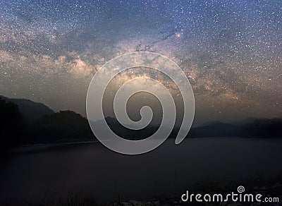 Beautiful Night Starry sky with Rising Milky Way over the mountain, Thailand Stock Photo