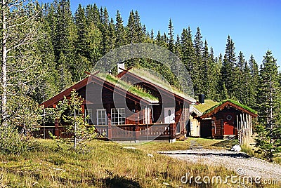 Typical norwegian rural cottage. Beautiful landscape of Norway. Stock Photo