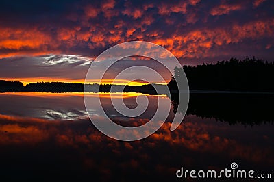 Beautiful Oceanside Sunset Mirror image Stock Photo