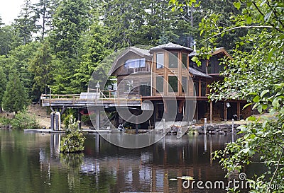 Beautiful Off Grid Home on Pond Stock Photo