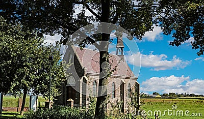 Beautiful old dutch chapel in idyllic rural landscape - Ohe en Laak (Sint Anna Chapel), Netherlands Stock Photo