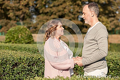 Beautiful old loving couple is dating in the Stock Photo