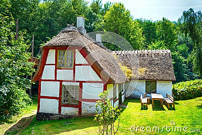 Beautiful old rustic thatched roof house. Denmark. Architecture Stock Photo