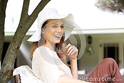 Beautiful older woman smiling with sun hat Stock Photo