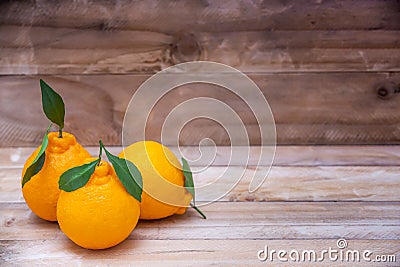 Beautiful Oranges Fruit on wooden table. rich with vitamins. background Stock Photo