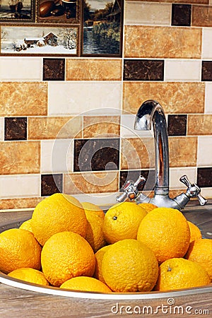 Beautiful oranges in the kitchen. Juicy fruits Stock Photo